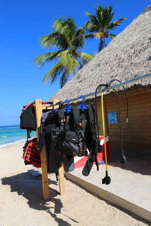 PUNTA CANA, DOMINICAN REPUBLIC - DECEMBER 31, 2014: Diving equipment ready for tourists at diving shop located at  Bavaro Beach in Punta Canaのeditorial素材