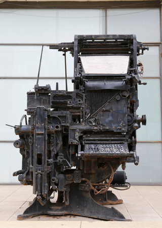 TEL AVIV, ISRAEL - NOVEMBER 25, 2014 : An old printing press machine being exhibited in the entrance of the Journalistic Center  in memory of Sokolov or Beit Sokolov in Tel Avivのeditorial素材