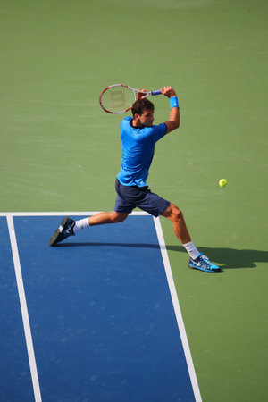 NEW YORK -SEPTEMBER 2, 2014: Professional tennis player Grigor Dimitrov from Bulgaria during round 4 match against Gael Monfils  at Billie Jean King National Tennis Center in New Yorkのeditorial素材