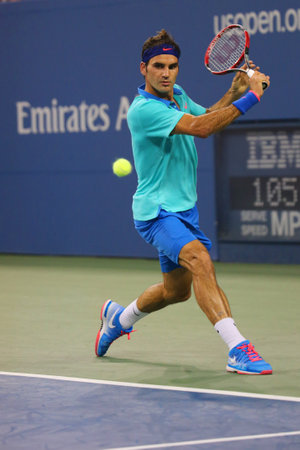 NEW YORK - AUGUST 31, 2014: Seventeen times Grand Slam champion Roger Federer  during third round match at US Open 2014 at Billie Jean King National Tennis Center in New Yorkのeditorial素材