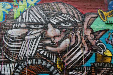 NEW YORK - NOVEMBER 13, 2014: Mural art in Downtown Brooklyn. A mural is any piece of artwork painted or applied directly on a wall, ceiling or other large permanent surfaceのeditorial素材