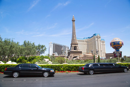 LAS VEGAS, NEVADA - MAY 9, 2014: Stretch limousines in the front of Paris Hotel & Casino. The first stretch limousine was created in Fort Smith, AR around 1928 by a coach company named Armbrusterのeditorial素材