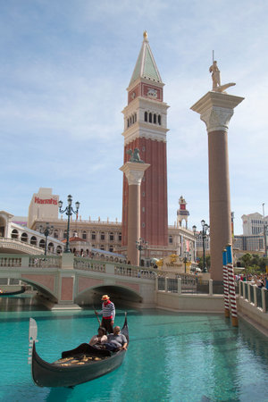 LAS VEGAS, NEVADA - MAY 9, 2014: Unidentified tourists enjoy gondola ride at Grand Canal at The Venetian Resort Hotel Casino. This luxury hotel opened in 1999 on Las Vegas Stripのeditorial素材