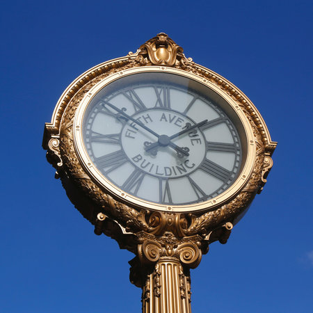 NEW YORK - JANUARY 31, 2015: Fifth Avenue Building Clock, completed in 1909 in the historical Flatiron district in Manhattanのeditorial素材