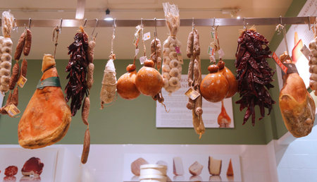 NEW YORK - FEBRUARY 19, 2015: Cured meat and salami in Italian store in New York. Little Italy is a neighborhood in lower Manhattan once known for its large population of Italiansのeditorial素材