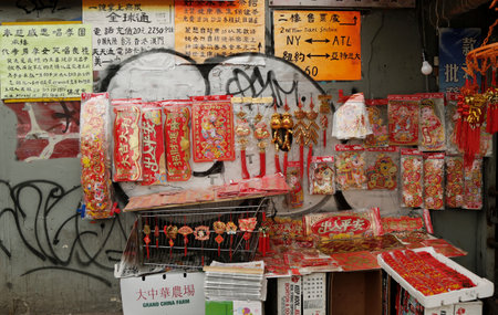 NEW YORK - FEBRUARY 26, 2015: Chinese souvenirs on display in Chinatown. Chinatown is a neighborhood in Manhattan that is home to the largest enclave of Chinese people in the Western Hemisphereのeditorial素材