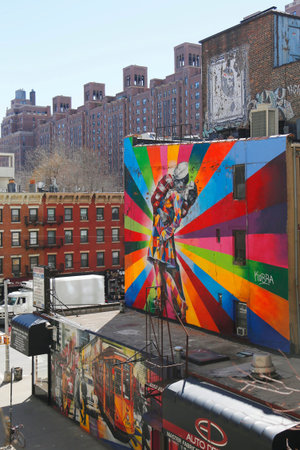NEW YORK - MARCH 12, 2015: Mural art by Brazilian Mural Artist Eduardo Kobra in Chelsea neighborhood in Manhattan. The mural is based on Alfred Eisenstaedt s 1945 photo from V-J Day in Times Squareのeditorial素材