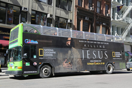NEW YORK - MARCH 12, 2015: Go NY tour Hop on Hop off bus with Killing Jesus TV premier advertisement...
