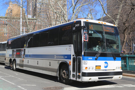 NEW YORK - MARCH 12, 2015:  New York City MTA bus at Madison Park Square in Manhattanのeditorial素材