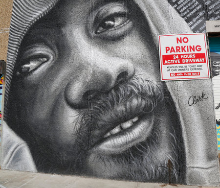 NEW YORK - MARCH 24, 2015: Mural art in Astoria section of Queens. A mural is any piece of artwork painted or applied directly on a wall, ceiling or other large permanent surfaceのeditorial素材