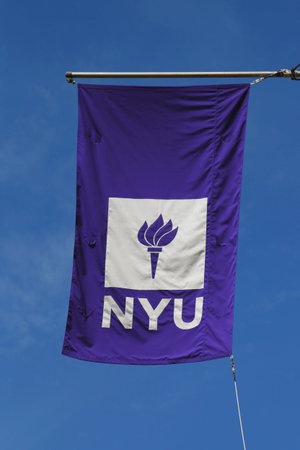 NEW YORK - APRIL 18, 2015: NYU flag on historic Puck Building  at Wagner Graduate School of Public...