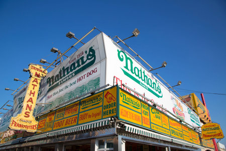 BROOKLYN NEW YORK  MAY 17 2014:The Nathan's original restaurant sign at Coney Island New York. The original Nathan s still exists on the same site that it did in 1916のeditorial素材