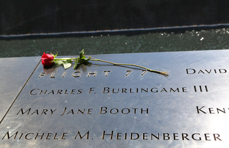 NEW YORK  JULY 17 2014: Flower left at the National 911 Memorial at Ground Zero in Lower Manhattanのeditorial素材