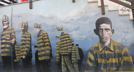 USHUAIA, ARGENTINA - APRIL 2, 2015: Mural art in Ushuaia, Argentina. A mural is any piece of artwork painted or applied directly on a wall, ceiling or other large permanent surfaceのeditorial素材