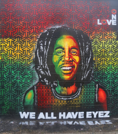 NEW YORK - JUNE 16, 2015: Mural art at Wellington Court in Astoria section in Queens. A mural is any piece of artwork painted or applied directly on a wall, ceiling or other large permanent surfaceのeditorial素材