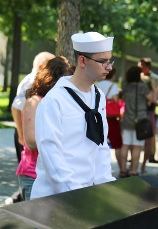 NEW YORK - JULY 11, 2015: Unidentified sailor at the National September 11 Memorial at Ground Zero in Lower Manhattanのeditorial素材