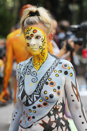 NEW YORK - JULY 18, 2015:Model during second NYC Body Painting Day in midtown Manhattan featuring artist Andy Golub in New York.Artists paint 100 fully nude models of all shapes and sizes during eventのeditorial素材