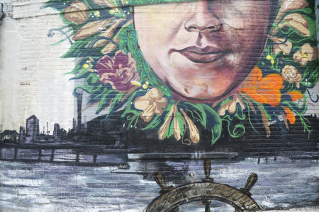 NEW YORK - JUNE 30, 2015: Mural art in Red Hook section of Brooklyn. A mural is any piece of artwork painted or applied directly on a wall, ceiling or other large permanent surfaceのeditorial素材