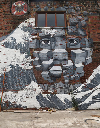 NEW YORK - JUNE 30, 2015: Mural art in Red Hook section of Brooklyn. A mural is any piece of artwork painted or applied directly on a wall, ceiling or other large permanent surfaceのeditorial素材
