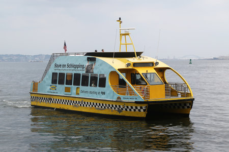 NEW YORK - JULY 30, 2015: New York City Water Taxi in the New York harbor.  NYC Water Taxi has been servicing NYC commuters since 2002のeditorial素材