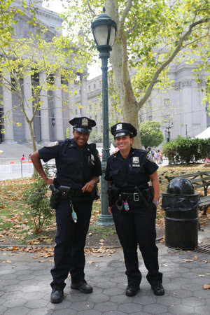 NEW YORK - AUGUST 8, 2015:NYPD officers providing security during Summer Streets Saturday in New York. Summer Streets is an annual celebration of New York City s most valuable public space our streetsのeditorial素材