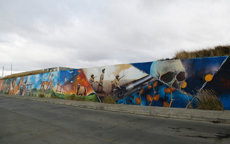 BAHIA AZUL, CHILE - APRIL 3, 2015: Mural art inspired by Patagonian history near Strait of Magellan ferry at Bahia Azul, Chileのeditorial素材