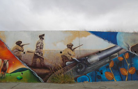 BAHIA AZUL, CHILE - APRIL 3, 2015: Mural art inspired by Patagonian history near Strait of Magellan ferry at Bahia Azul, Chileのeditorial素材