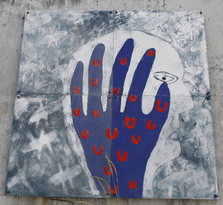 BAHIA AZUL, CHILE - APRIL 3, 2015: Mural art inspired by Patagonian history near Strait of Magellan ferry at Bahia Azul, Chileのeditorial素材