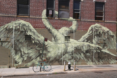 NEW YORK - JULY 17, 2015: Mural art in Lower Manhattan. A mural is any piece of artwork painted or applied directly on a wall, ceiling or other large permanent surfaceのeditorial素材
