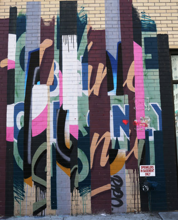 NEW YORK - JULY 17, 2015: Mural art in Lower Manhattan. A mural is any piece of artwork painted or applied directly on a wall, ceiling or other large permanent surfaceのeditorial素材