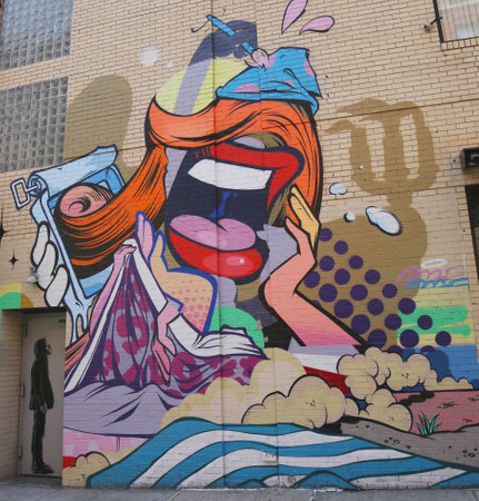 NEW YORK - AUGUST 8, 2015: Mural art in Lower Manhattan. A mural is any piece of artwork painted or applied directly on a wall, ceiling or other large permanent surfaceのeditorial素材