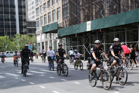 NEW YORK - AUGUST 8, 2015:NYPD officers providing security during Summer Streets Saturday in New...