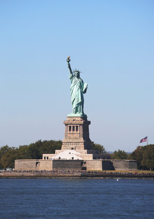 NEW YORK - SEPTEMBER 24, 2015: The Statue of Liberty in New York Harborのeditorial素材