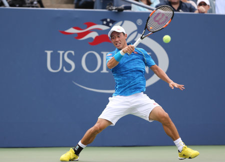 NEW YORK - AUGUST 31, 2015: Professional tennis player Kei Nishikori of Japan in action during first round match at US Open 2015 at Billie Jean King National Tennis Center in New Yorkのeditorial素材