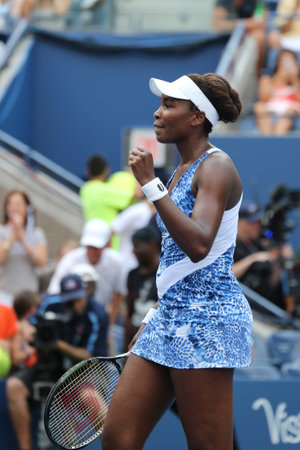 EW YORK - AUGUST 31, 2015: Grand Slam champion Venus Williams celebrates victory after her first round match at US Open 2015 at National Tennis Center in New Yorkのeditorial素材
