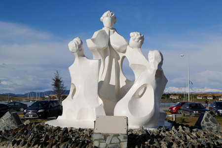 USHUAIA, ARGENTINA - APRIL 2, 2015: Statue by Father Ellero Jose in Ushuaia, Argentinaのeditorial素材