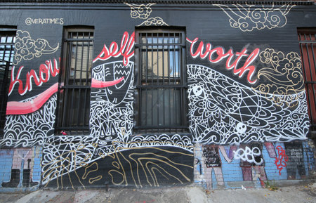 NEW YORK - DECEMBER 15, 2015: Mural art at Dodworth Street in Brooklyn. A mural is any piece of artwork painted or applied directly on a wall, ceiling or other large permanent surfaceのeditorial素材