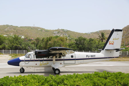 ST. BARTHS, FRENCH WEST INDIES -JUNE 13, 2015:  Winair DHC-6 aircraft landed at St Barths airport....