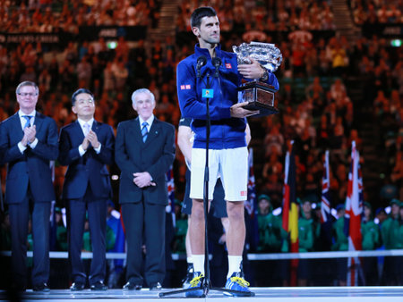 MELBOURNE, AUSTRALIA - JANUARY 31, 2016: Grand Slam champion Novak Djokovic of Sebia holding Australian Open trophy during trophy presentation after victory at Australian Open 2016 in Melbourne Parkのeditorial素材