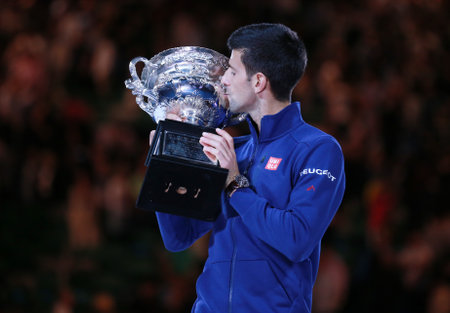 MELBOURNE, AUSTRALIA - JANUARY 31, 2016: Grand Slam champion Novak Djokovic of Sebia holding Australian Open trophy during trophy presentation after victory at Australian Open 2016 in Melbourne Parkのeditorial素材
