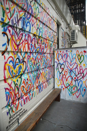 NEW YORK - MARCH 10, 2016:  Bleeding Hearts Lovewall mural by artist JGoldcrown in Soho in Manhattan.のeditorial素材