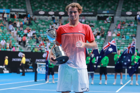 MELBOURNE, AUSTRALIA - JANUARY 30, 2016: Australian Open 2016 Junior Boys Singles Champion Oliver Anderson of Australia during trophy presentation after victory at Australian Open 2016 in Melbourneのeditorial素材