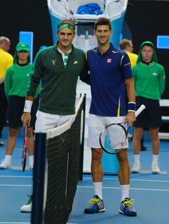 MELBOURNE, AUSTRALIA - JANUARY 28, 2016: Grand Slam champions Roger Federer of Switzerland (L) and Novak Djokovic of Serbia before semifinal match at Australian Open 2016 in Melbourne Parkのeditorial素材