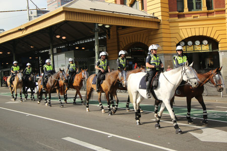 MELBOURNE, AUSTRALIA - JANUARY 25, 2016: Victorian Police Mounted Branch Constables providing security during Australia Day Parade in Melbourneのeditorial素材