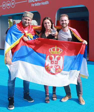 MELBOURNE, AUSTRALIA - JANUARY 31, 2016: Serbian tennis fans with flags at Australian Open 2016 at Australian tennis center in Melbourne Parkのeditorial素材