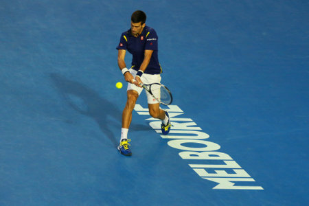 MELBOURNE, AUSTRALIA - JANUARY 31, 2016: Eleven times Grand Slam champion Novak Djokovic of Serbia in action during his Australian Open 2016 final match at Rod Laver Arena in Melbourne Parkのeditorial素材
