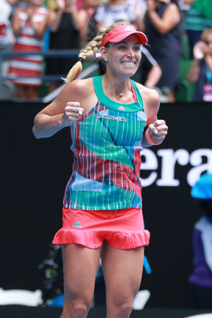 MELBOURNE, AUSTRALIA - JANUARY 27, 2016: Professional tennis player Angelique Kerber of Germany celebrates victory after quarterfinal match at Australian Open 2016 at Rod Laver Arena in Melbourne Parkのeditorial素材