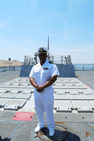 NEW YORK - MAY 26, 2016: Unidentified officer on the deck of US guided missile destroyer  USS Farragut during Fleet Week 2016 in New Yorkのeditorial素材