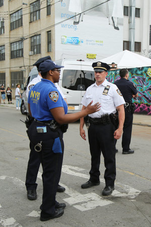 NEW YORK - JUNE 4, 2016: NYPD and Community Affairs officers providing security at Hip Hop concert...