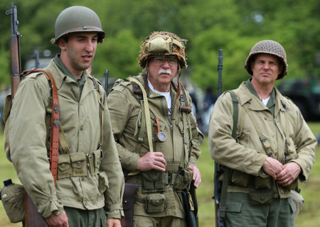 OLD BETHPAGE , NEW YORK - MAY 22, 2016: World War II Encampment participant in World War II American Army uniform in Old Bethpage, NYのeditorial素材